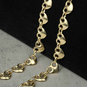 10k yellow gold hollow classic puff heart Gucci link chain necklace close-up display.