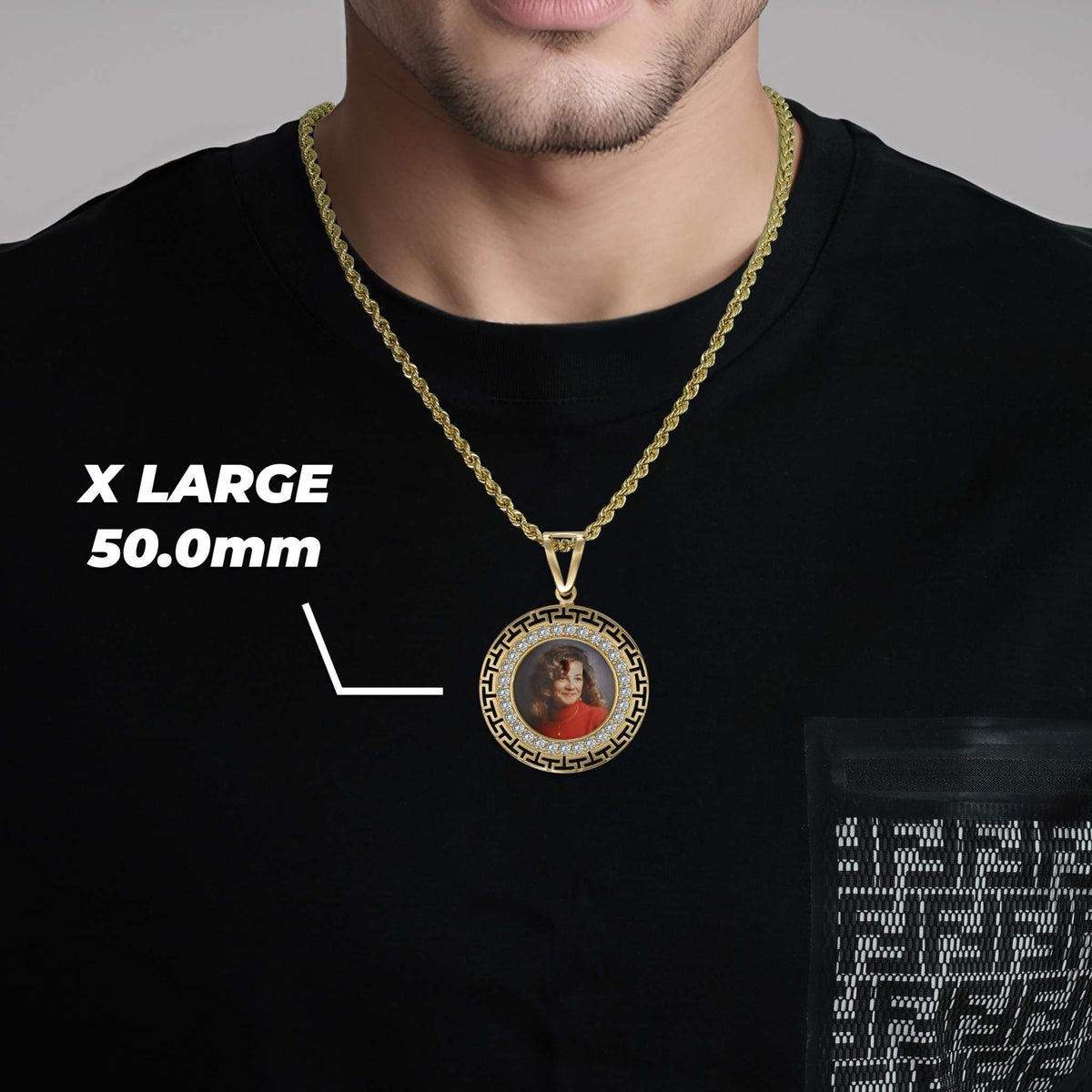 Man wearing a gold chain necklace with an extra-large 50.0mm round memorial pendant featuring a custom photo.