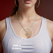 Model wearing a 21mm two-tone gold San Judas heart pendant, labeled as Size 3.