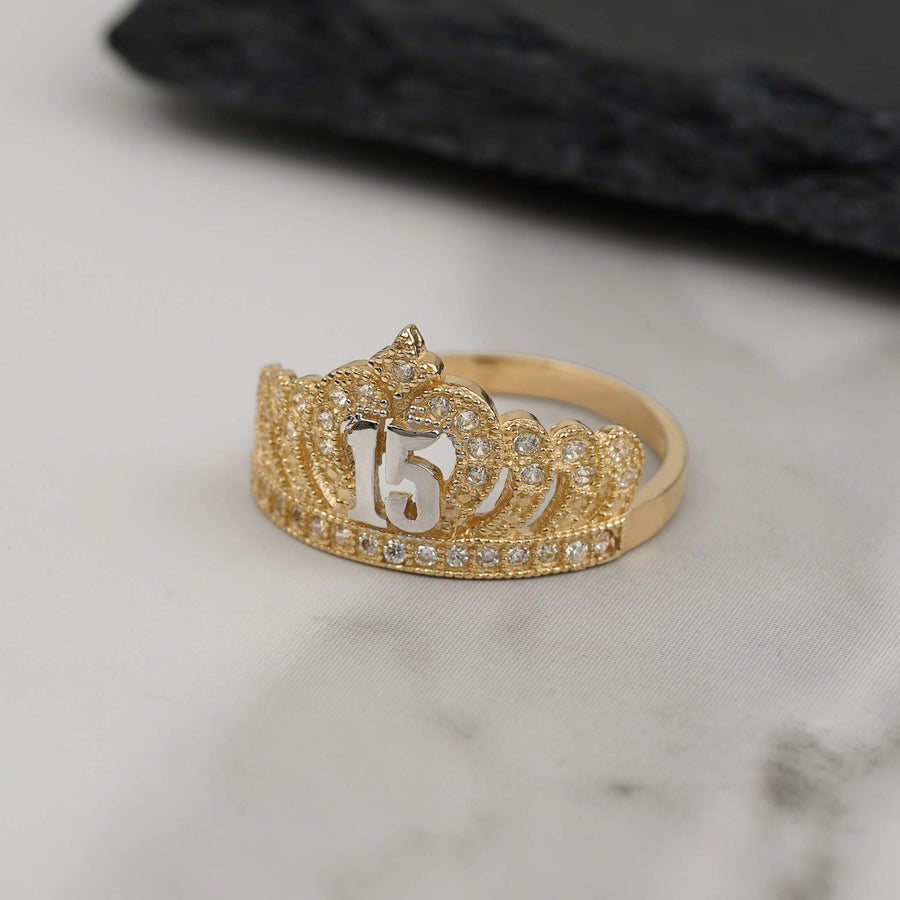 Two-tone gold crown quinceañera ring with number 15 and pavé cubic zirconia.