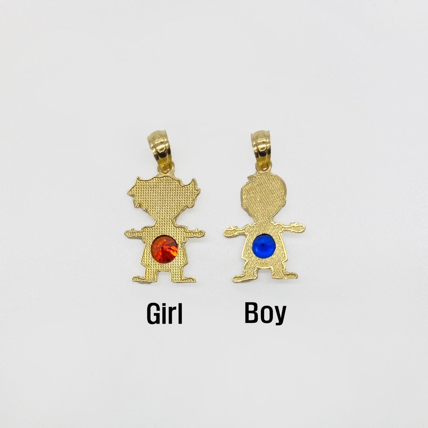 Textured gold girl and boy pendants with red and blue gemstones, labeled with text.