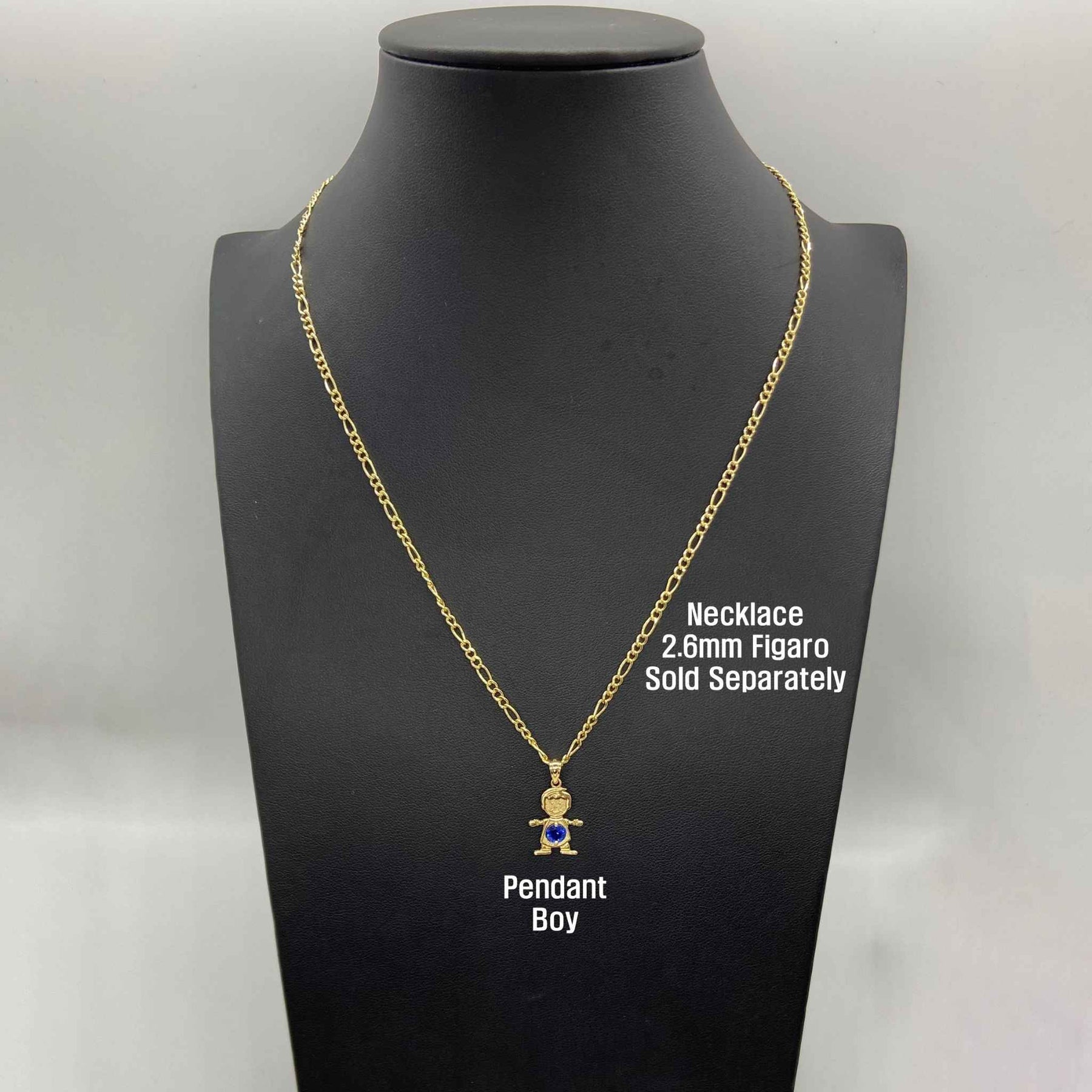 Gold boy pendant with blue birthstone on a chain displayed on a black bust.