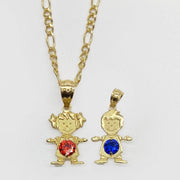 Yellow gold boy and girl pendants with blue and red gemstones on white background.