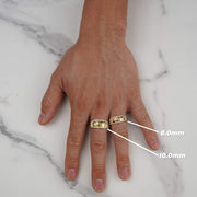 Hand wearing 8.0mm and 10.0mm gold classic nugget band rings with dimension labels.