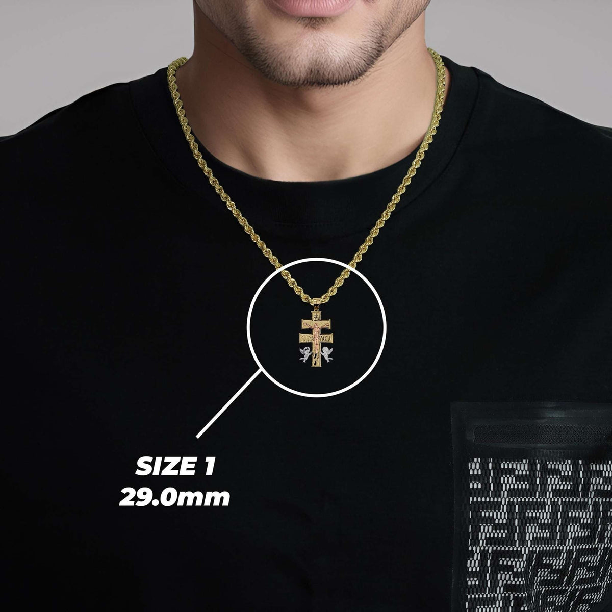 Man wearing Size 1 29.0mm gold Caravaca cross pendant necklace on a rope chain.
