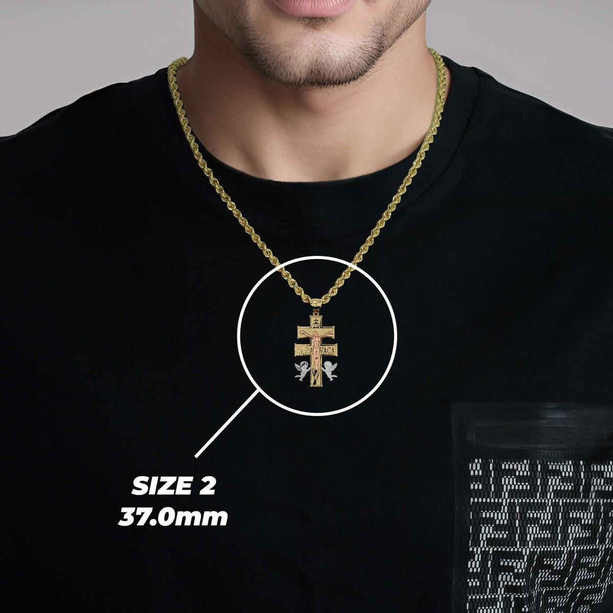 Model wearing a gold chain with the 37.0mm Caravaca crucifix pendant highlighted in white.
