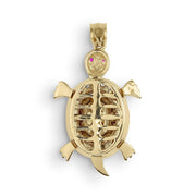 Rear view of a 10k or 14k gold open-back turtle pendant isolated on white background.