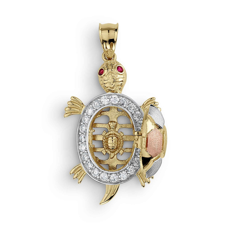 Tricolor gold turtle pendant featuring an open-back design with sparkling cubic zirconia stones.