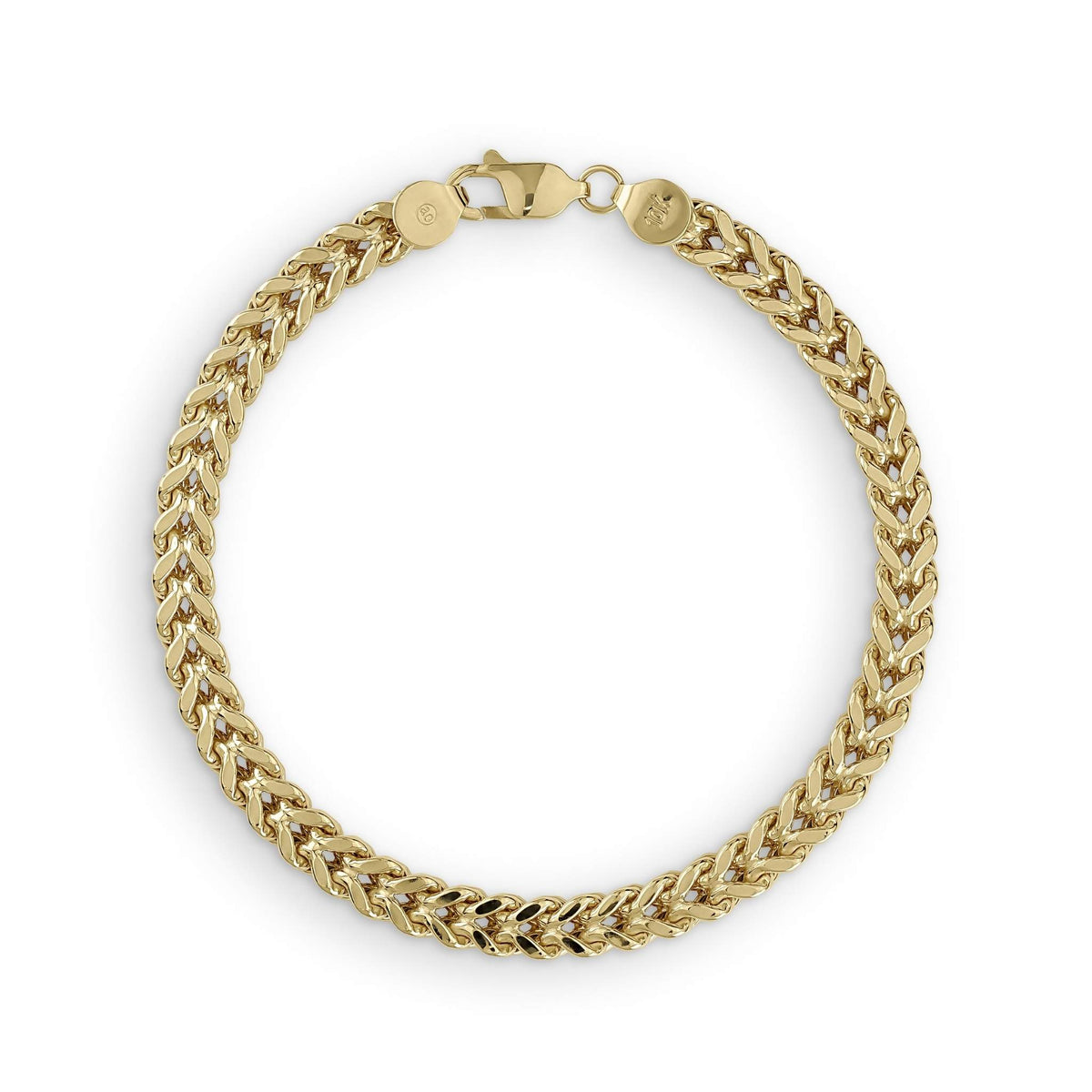 Overhead view of a yellow gold hollow Franco link bracelet in a circle