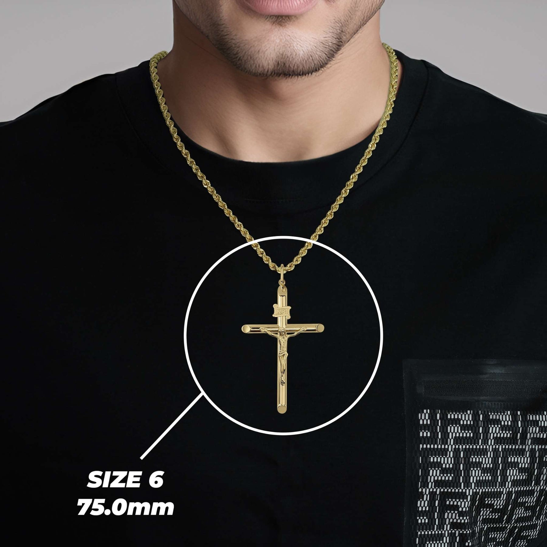 Man wearing Size 6 75.0mm gold INRI crucifix pendant on a gold chain.