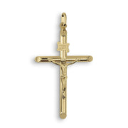 Front view of a yellow gold INRI crucifix cross pendant on white background.