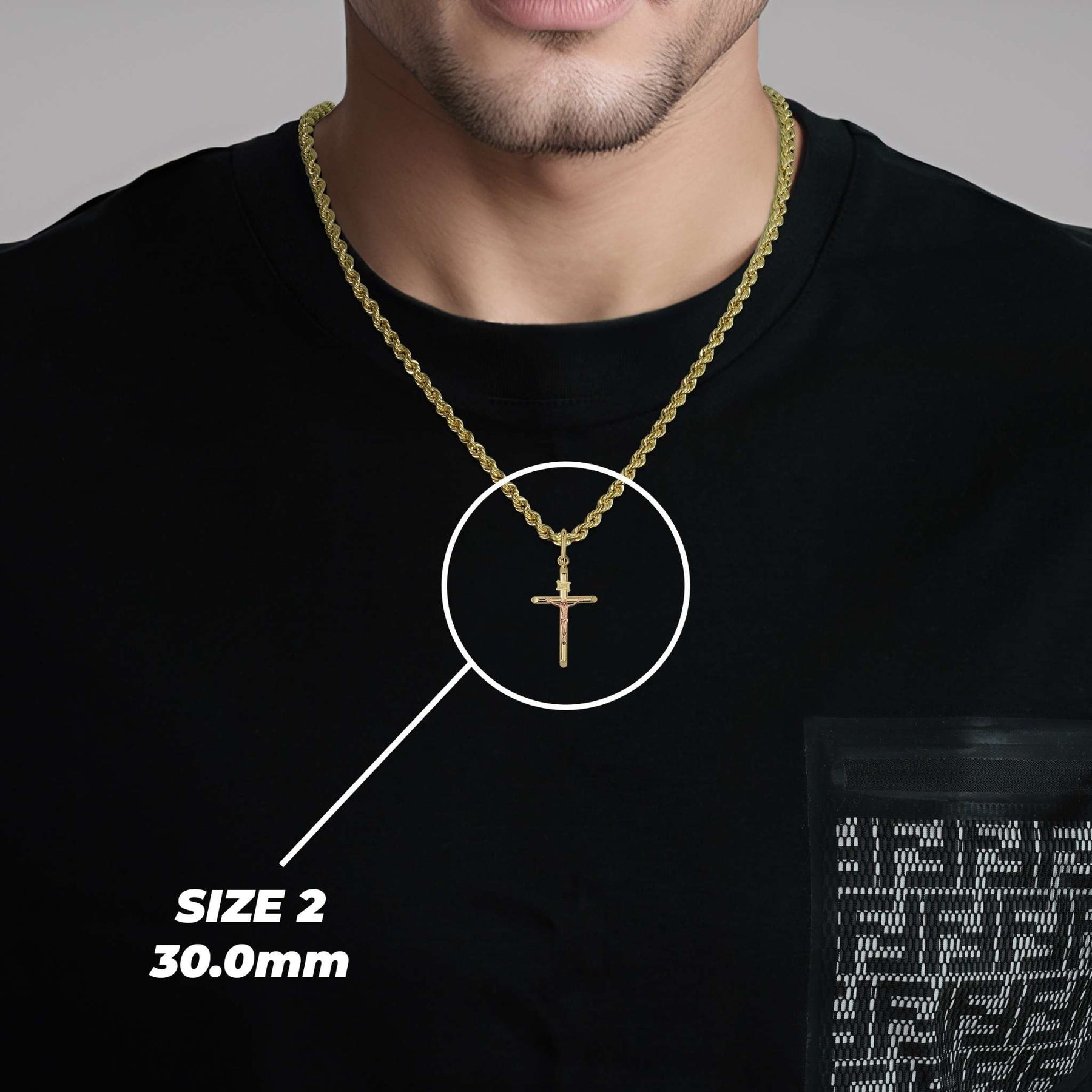 Man wearing a two-tone gold cross necklace with Size 2 30.0mm pendant highlighted.