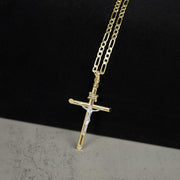 14k and 10k two-tone gold classic crucifix pendant with a Figaro chain.