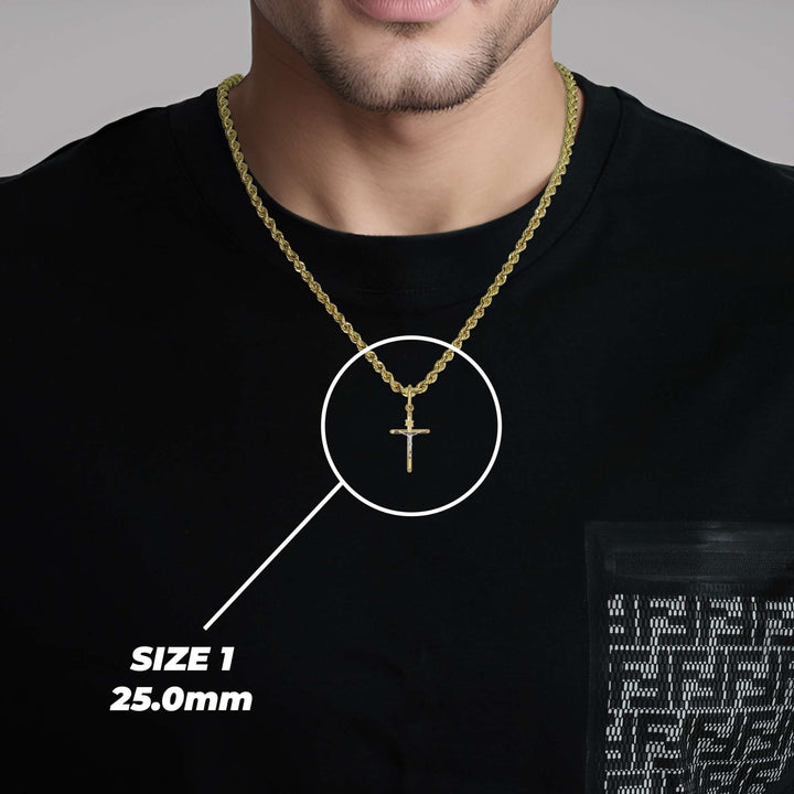 Man wearing a size 1 25.0mm gold and rose gold tubular INRI crucifix pendant on a black shirt.