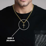 Man wearing a size 2 30.0mm gold and rose gold tubular INRI crucifix pendant on a black shirt.