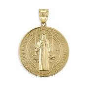 Close-up of a gold Saint Benedict medal pendant featuring intricate front engravings and bail.