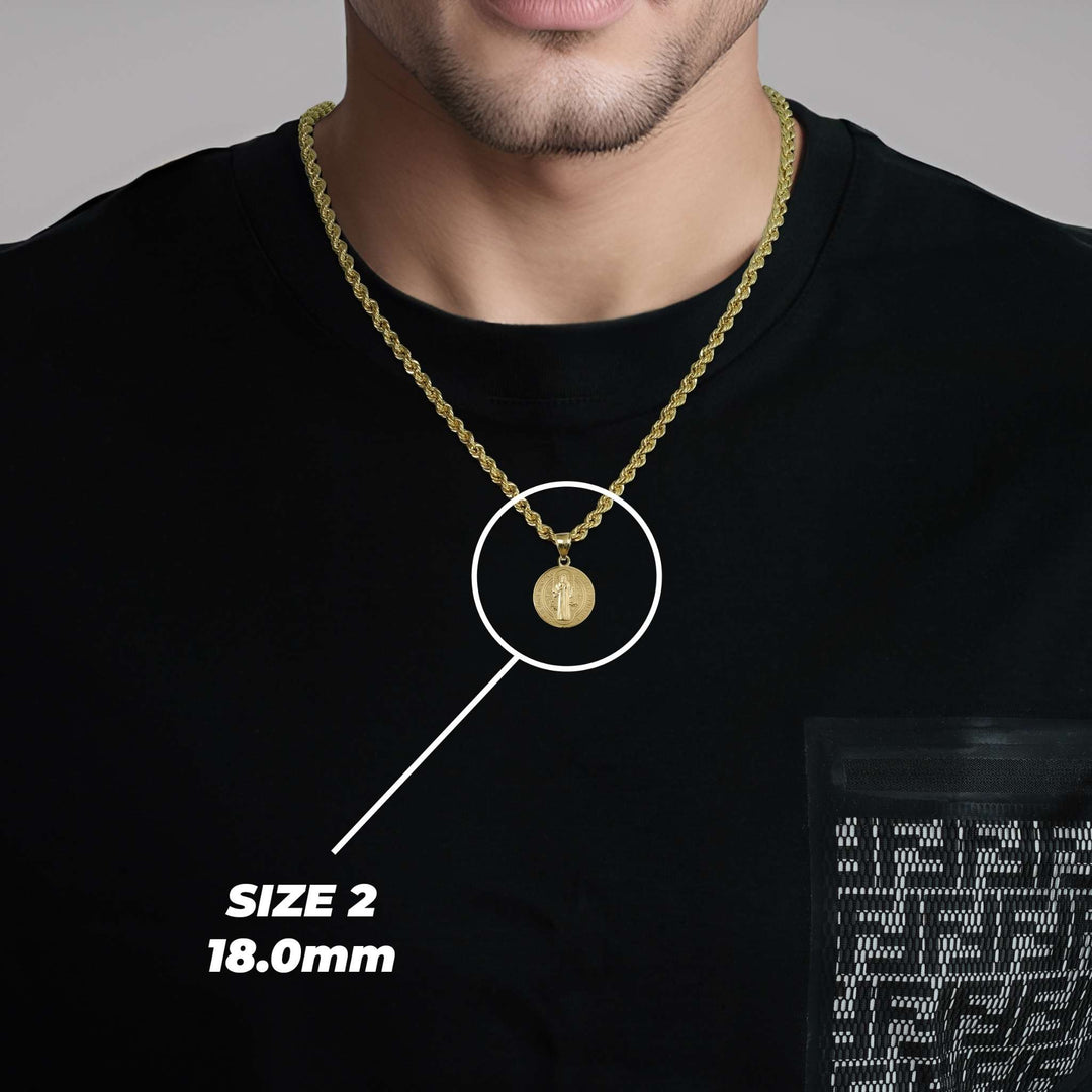 A man wearing a gold Saint Benedict pendant on a chain with text overlay reading SIZE 2 18.0mm.