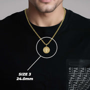 A man wearing a gold Saint Benedict pendant on a chain with text overlay reading SIZE 3 24.0mm.