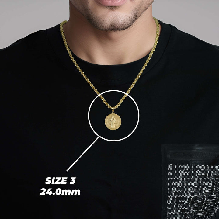 A man wearing a gold Saint Benedict pendant on a chain with text overlay reading SIZE 3 24.0mm.