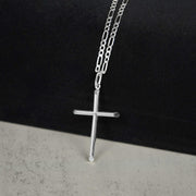 Polished white gold tube cross pendant necklace styled on a delicate paperclip chain.