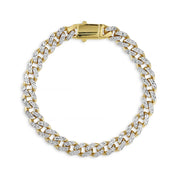 Circular display of a gold DC Monaco Miami Cuban chain bracelet with pave links.