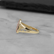 Side profile of the 10k and 14k gold Alvia Virgin Mary ring.