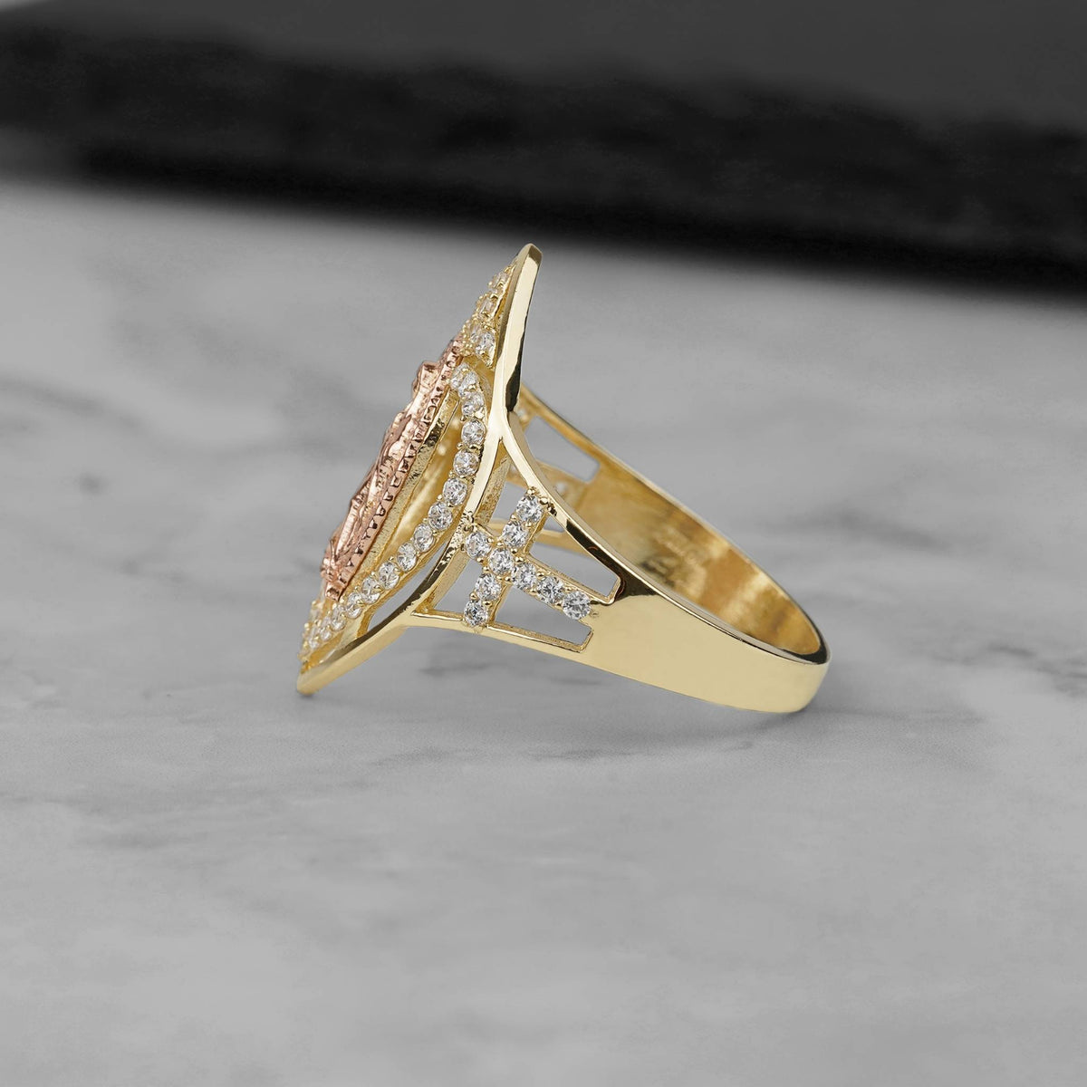 Side profile of the 10k and 14k gold marquise Virgin Mary ring