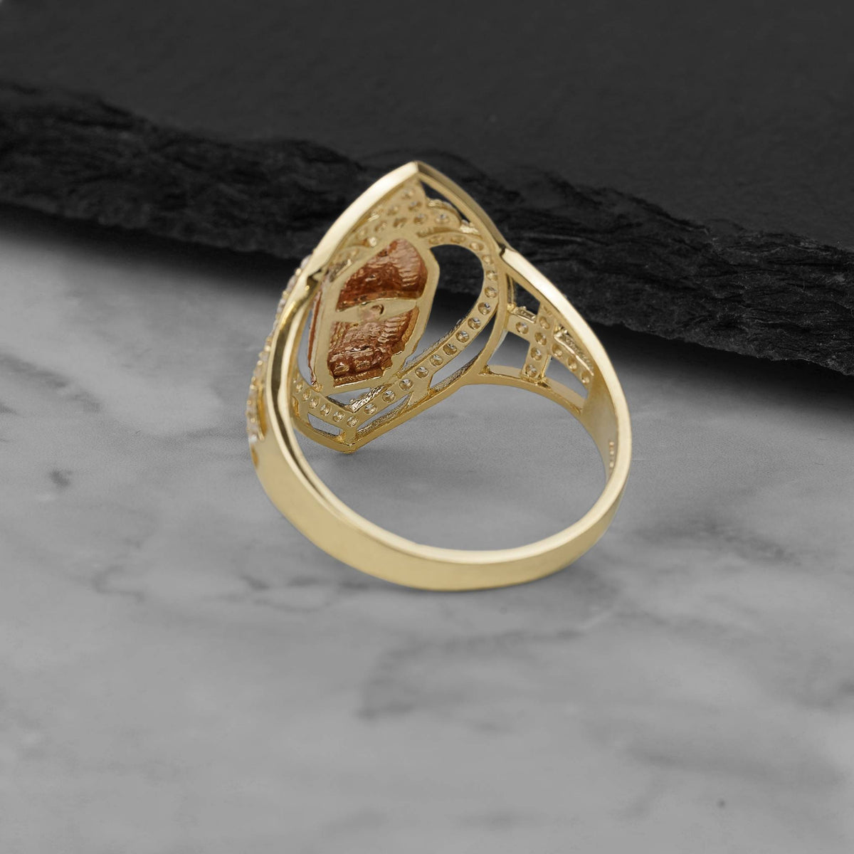 Rear angle view of the 10k and 14k gold marquise Virgin Mary ring.