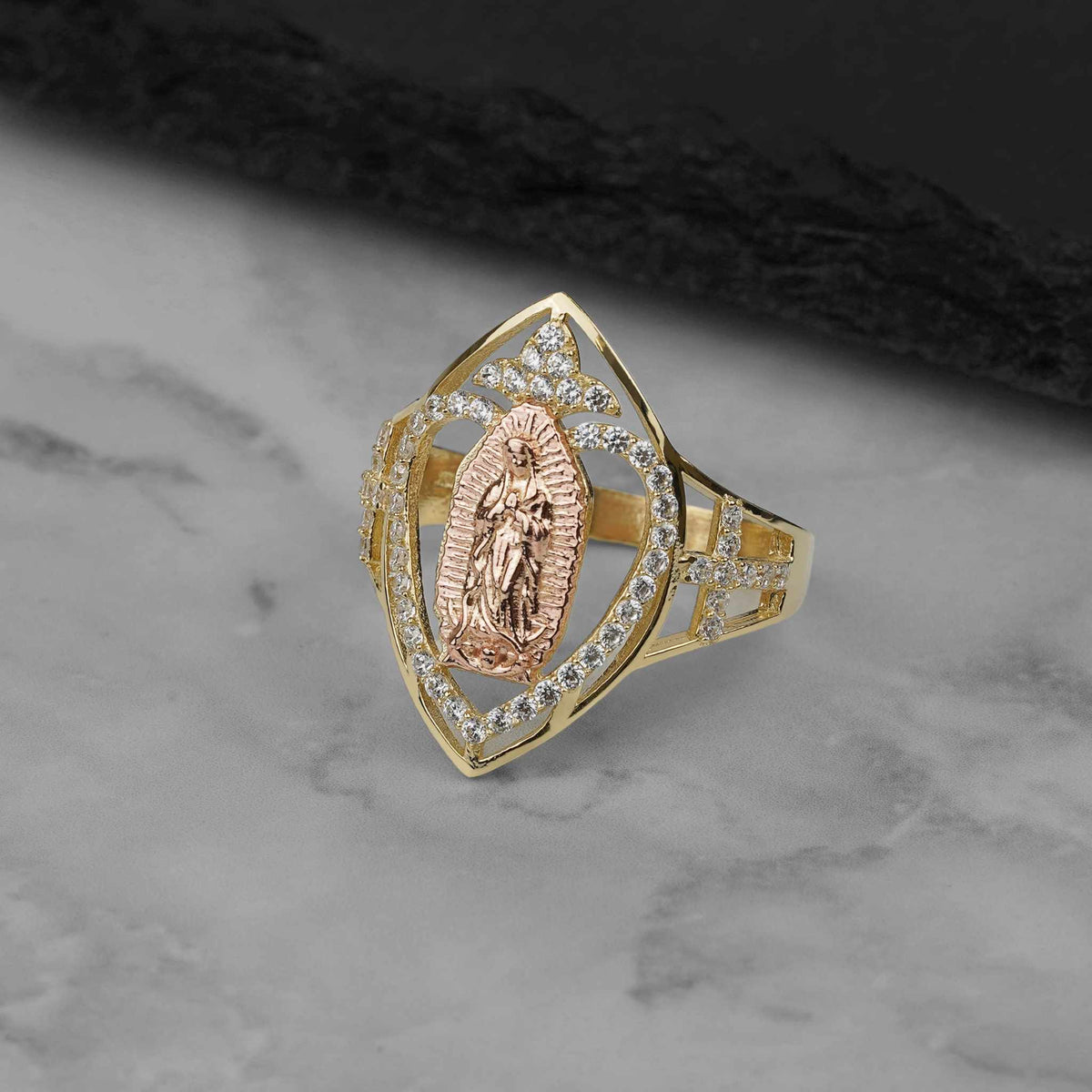 Close-up of the 10k and 14k gold marquise Virgin Mary ring