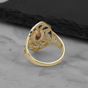Rear view of the 10k and 14k gold Virgin Mary ring showing its inner band construction.