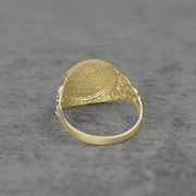 10k - 14k round nugget ring back view on a gray textured surface