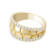 Close-up of a gold nugget band ring with two rows of sparkling cubic zirconia.