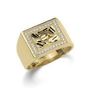 Close-up of a men's yellow gold rectangle nugget ring accented with shimmering stones.