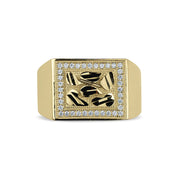 Gold rectangle nugget ring with a gemstone border featuring a textured leaf pattern