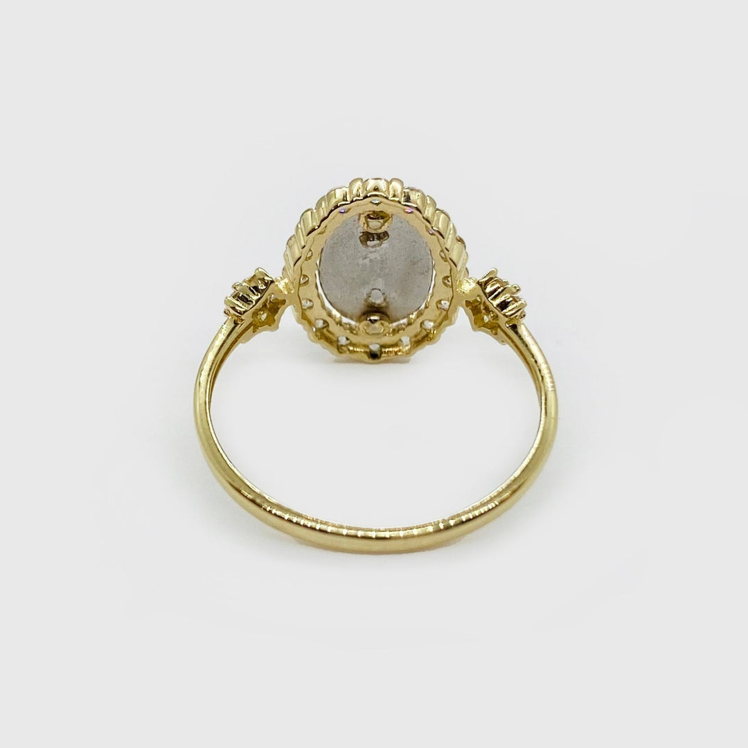 14k gold Virgen de Guadalupe oval ring with cubic zirconia, close-up detail