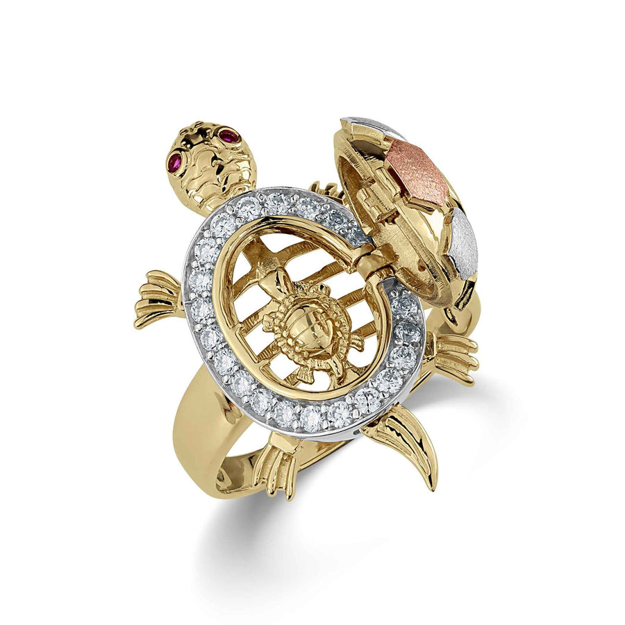 Tricolor gold open-back turtle ring with cubic zirconia accents isolated on a white background