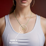 Close-up photo of the yellow gold butterfly pendant necklace worn by a model, showing Size 2 (14.0mm).