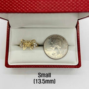 10k - 14k Gold butterfly ring in a red box with a quarter for scale.
