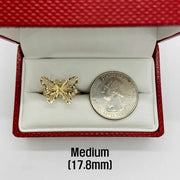 10k - 14k Gold butterfly ring in a red box with a quarter for comparison.