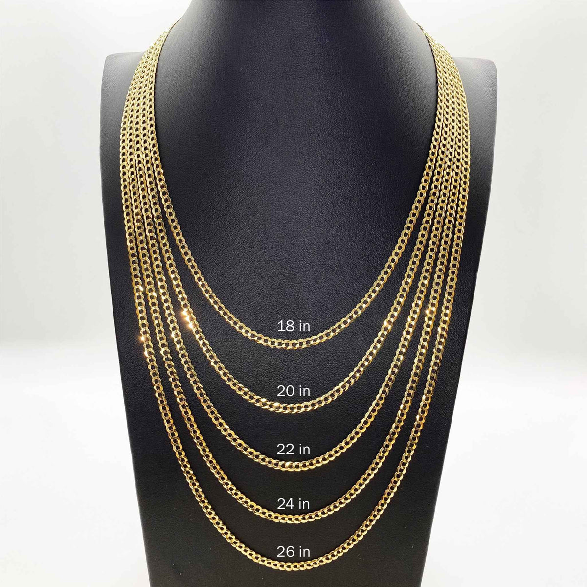 Gold Cuban curb chain length comparison guide on bust display showing 18 to 26 inches.