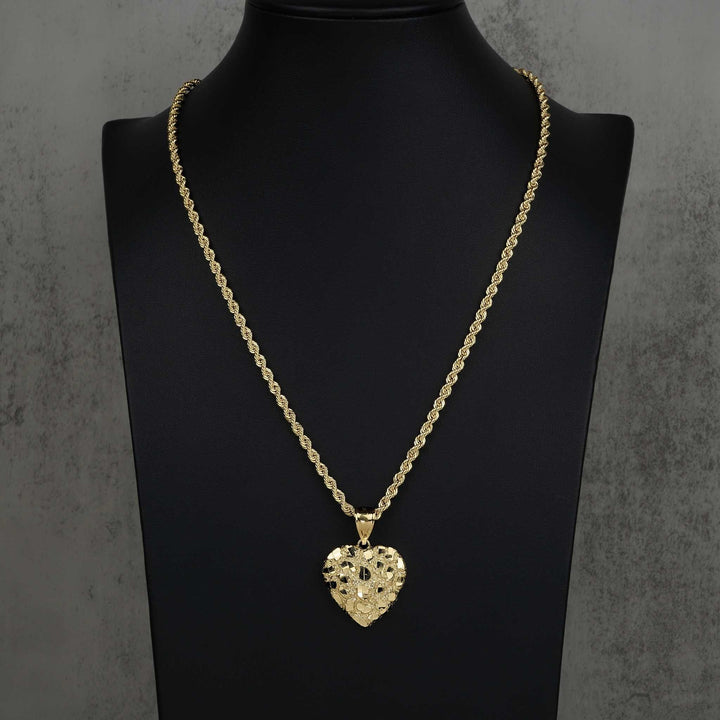 Textured 10k or 14k gold heart-shaped nugget pendant hanging from a classic rope chain.