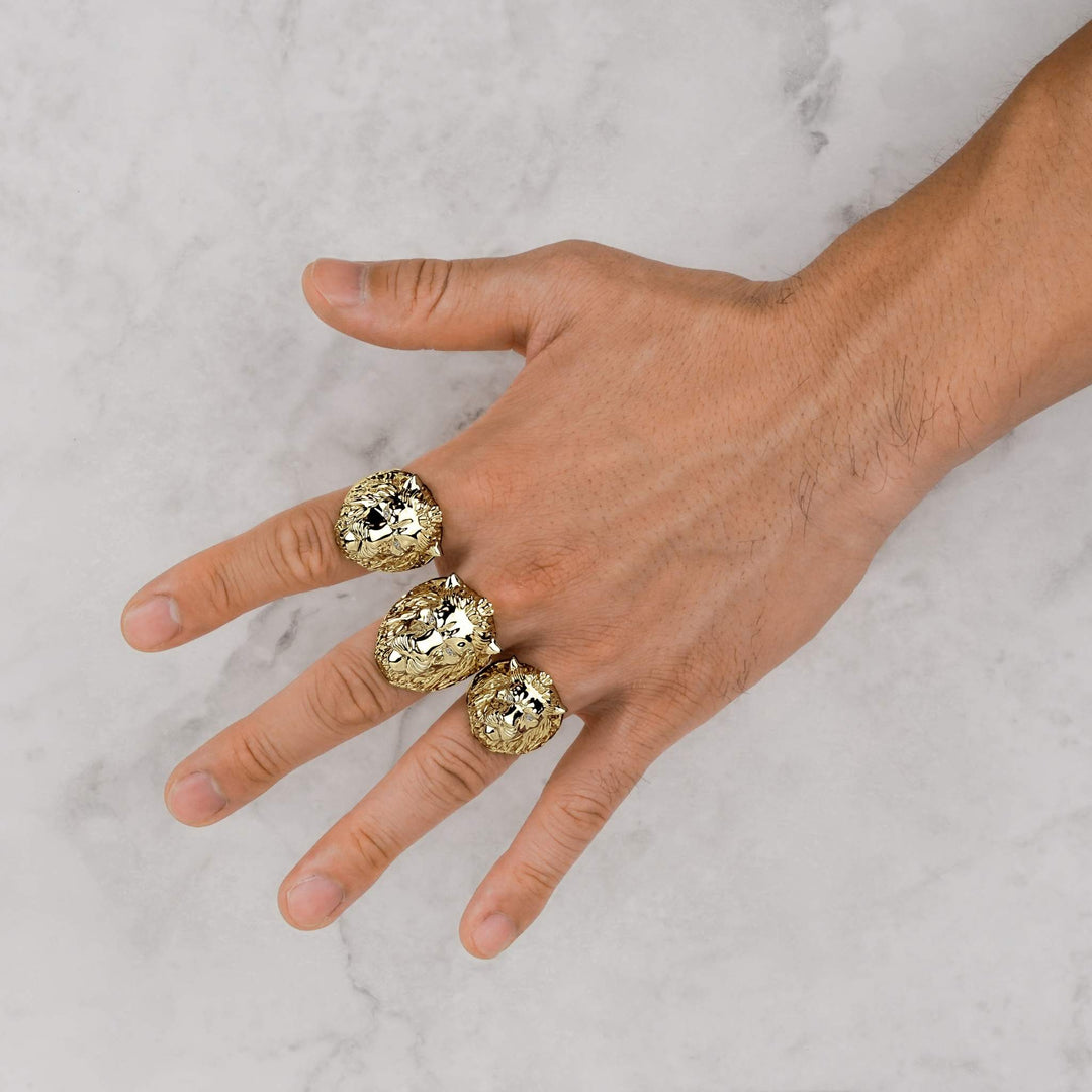 Hand wearing small, medium, and large sizes of 10k & 14k Gold Classic One-Tone Lion Ring.