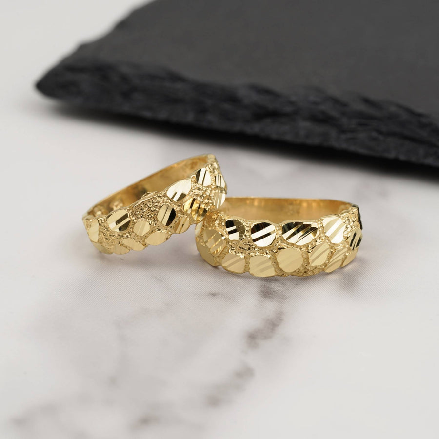 Pair of 10k and 14k gold classic nugget band rings in 6.5mm and 8.0mm widths.