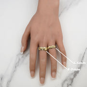 Close-up view of 6.5mm and 8.0mm yellow gold classic nugget band rings on hand.