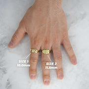 Two gold classic nugget oval rings worn on fingers showing Size 1 and Size 2.