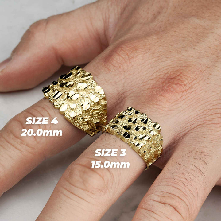 Two bold, textured yellow gold square nugget rings displayed on a hand for scale.