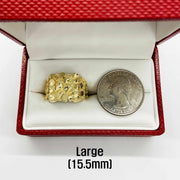 10k - 14k gold nugget in a red box with a coin for size comparison on a white background