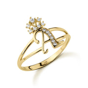 10k yellow gold crown cursive initial ring featuring cubic zirconia accents.