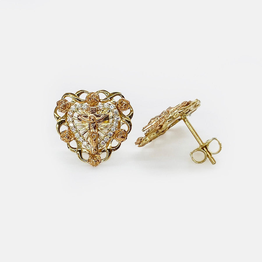 Two-tone yellow and rose gold heart stud earrings featuring a center crucifix and roses.