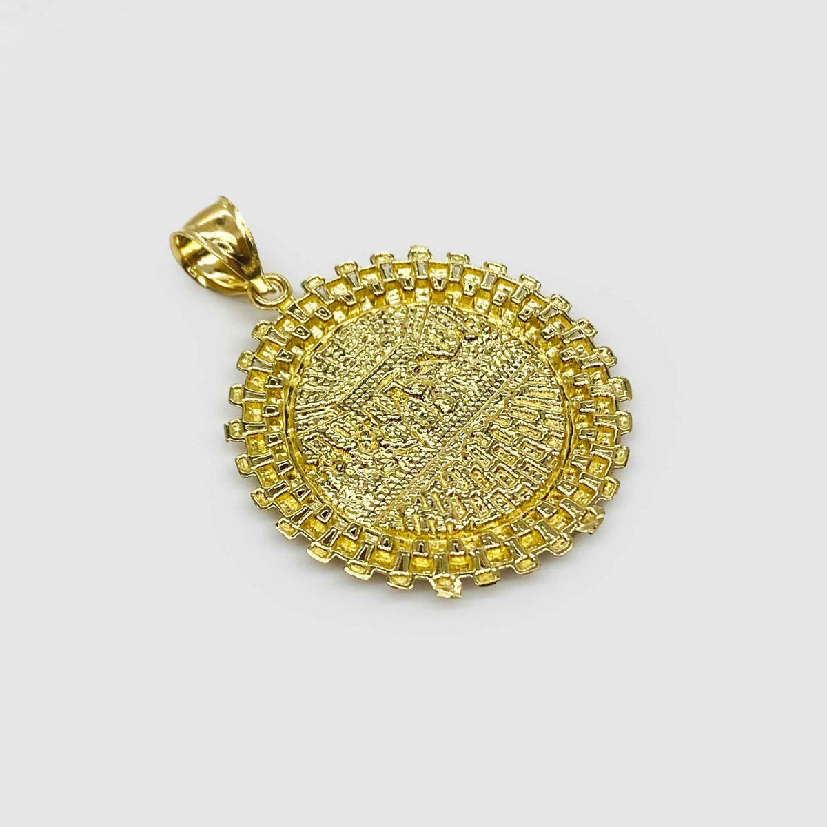 Back view of round gold Divine Last Supper pendant isolated on light gray background.
